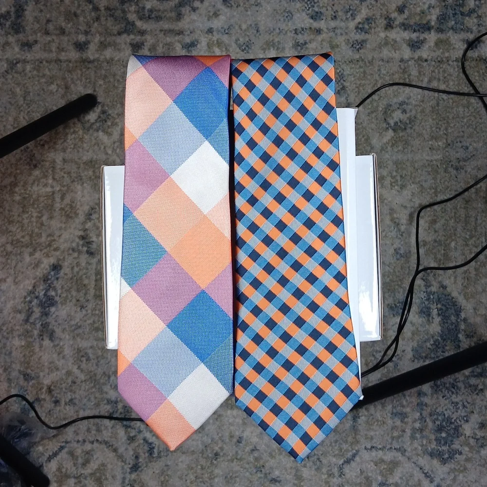 Pair of orange and blue polyester Izod‎ ties.